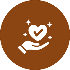 Icon with a brown circle background, featuring a white hand holding a heart with a checkmark inside, small sparkles around it, symbolizing the caring and unity found in a diverse church congregation.